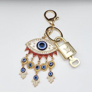 Authentic Louis Vuitton Lock & Key with Unbranded Evil Eye Charm, Keychain